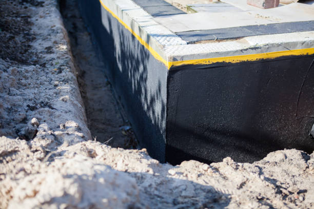 Professional Waterproofing technician working in Chester, MD